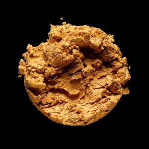 Golden makeup powder still life photography by sofus graae
